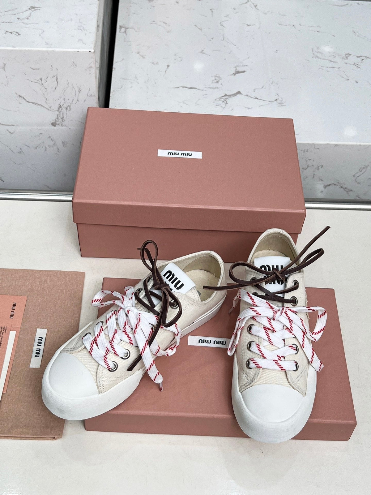 WASHED-DENIM SNEAKERS IN OFF WHITE CANVAS WITH BROWN AND STRIPED LACES