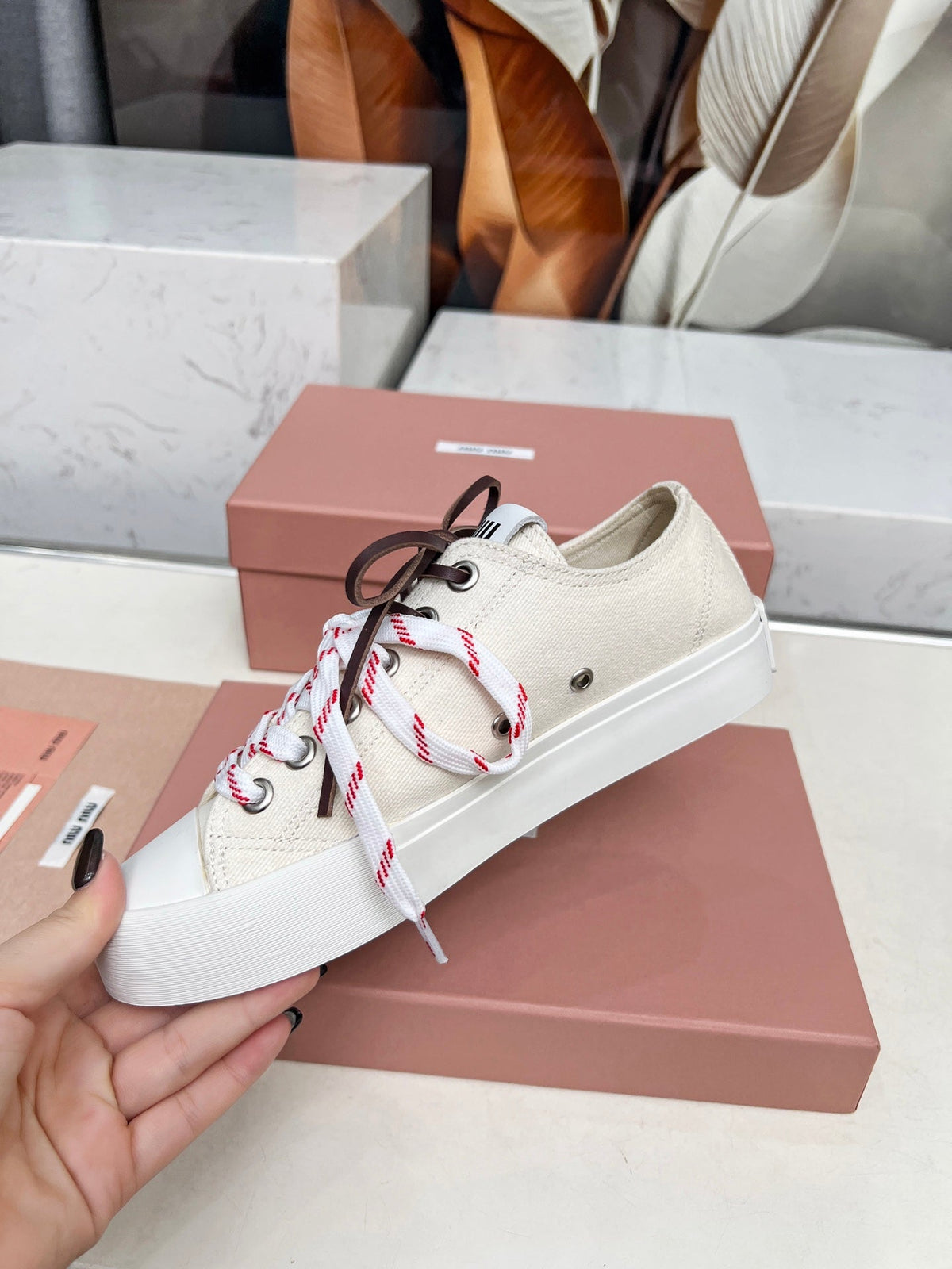 WASHED-DENIM SNEAKERS IN OFF WHITE CANVAS WITH BROWN AND STRIPED LACES