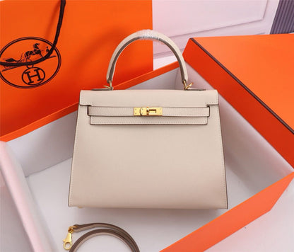 HERM Kelly 25 Cream Togo Leather Gold Hardware