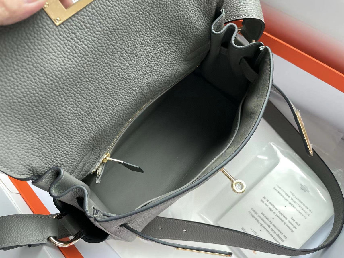 HERM KELLY MESSENGER 25