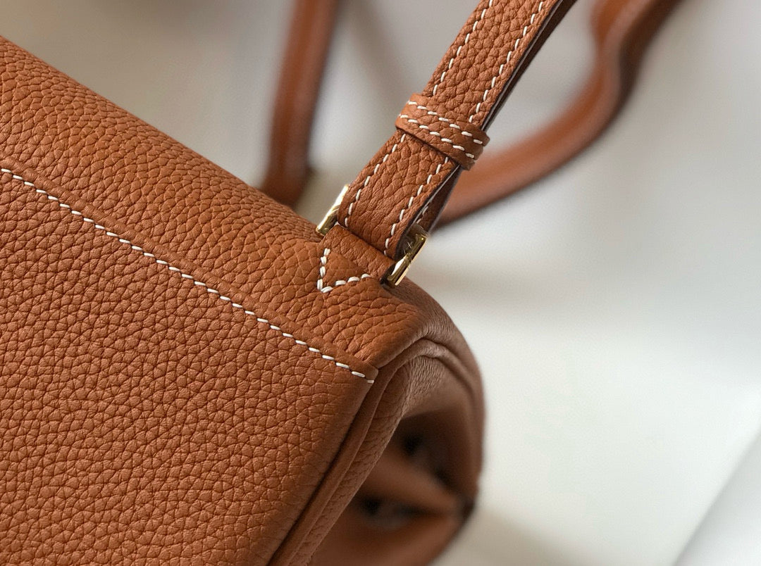 KELLY ADO 22 TOGO BACKPACK IN BROWN CALFSKIN GOLD HARDWARE