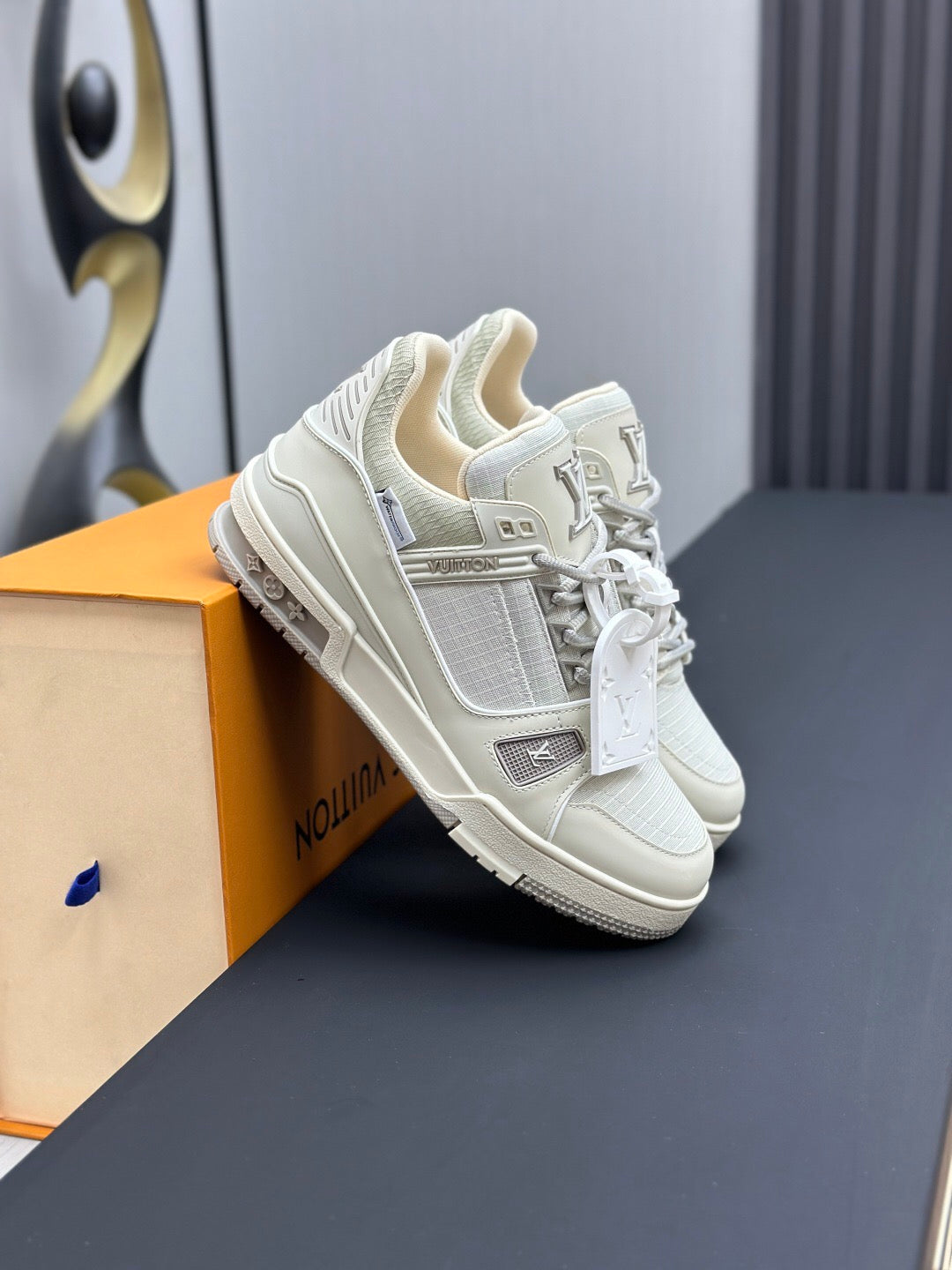 LV TRAINER SNEAKER IN GREY CALFSKIN