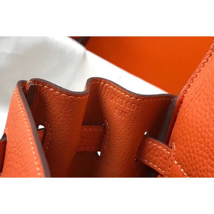 HERM Kelly 25cm Retourne Bag In Orange Clemence Leather