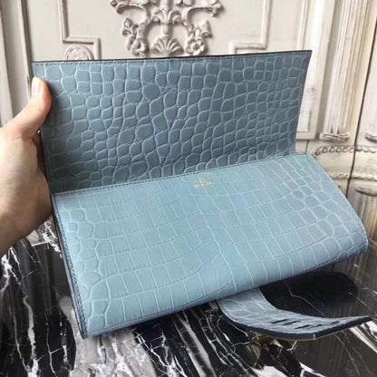 HERM Medor Clutch Bag In Ciel Crocodile Leather