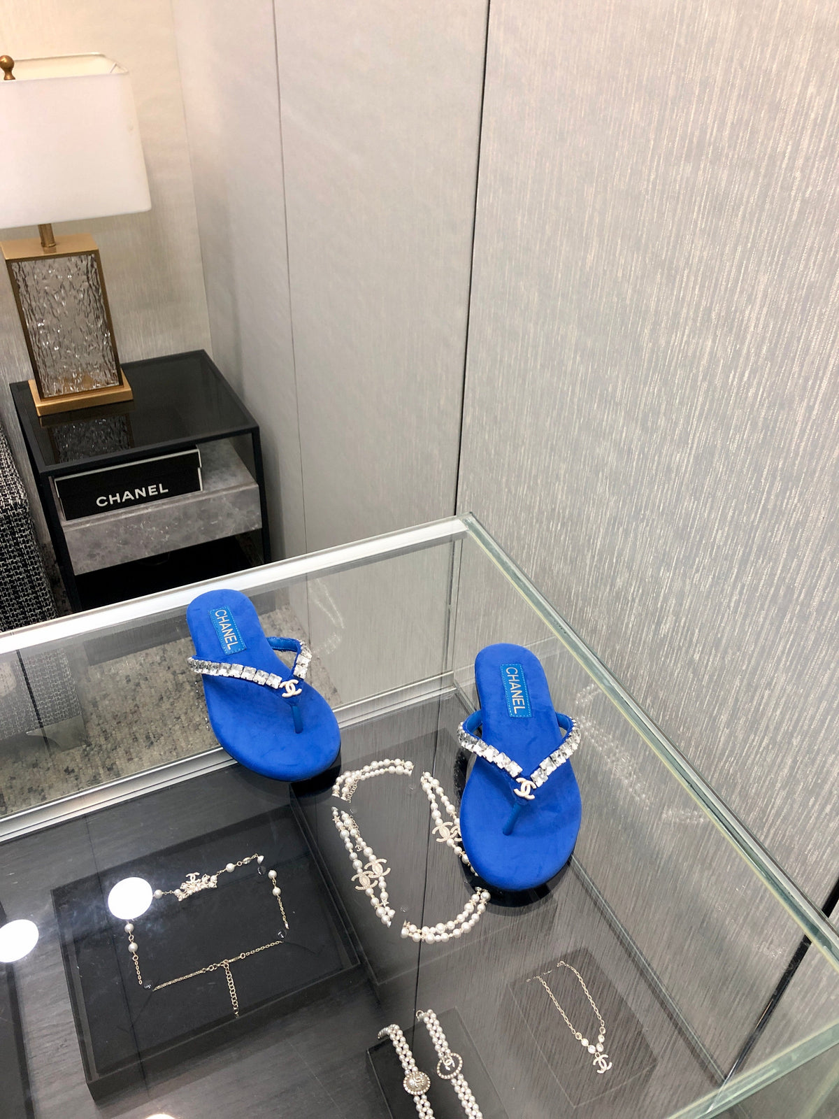 THONG SLIDE IN COBALT BLUE SUEDE WITH WHITE CRYSTALS
