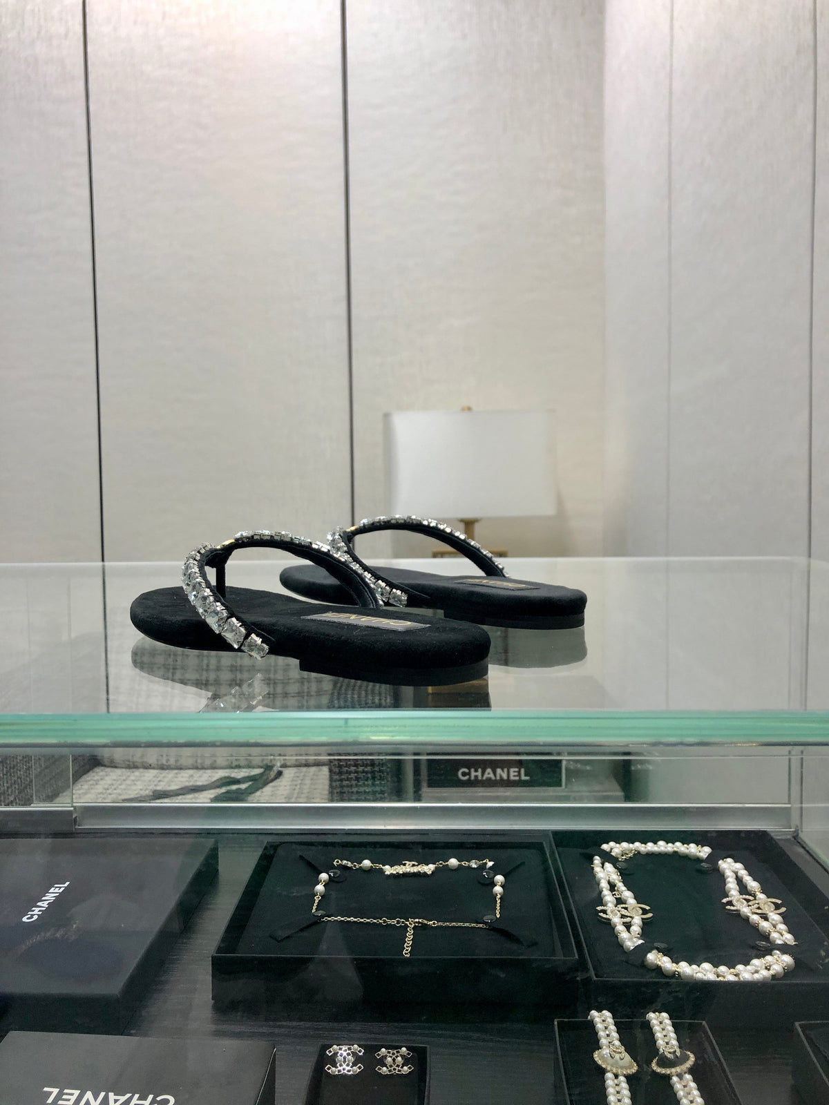 THONG SLIDE IN BLACK SUEDE WITH WHITE CRYSTALS