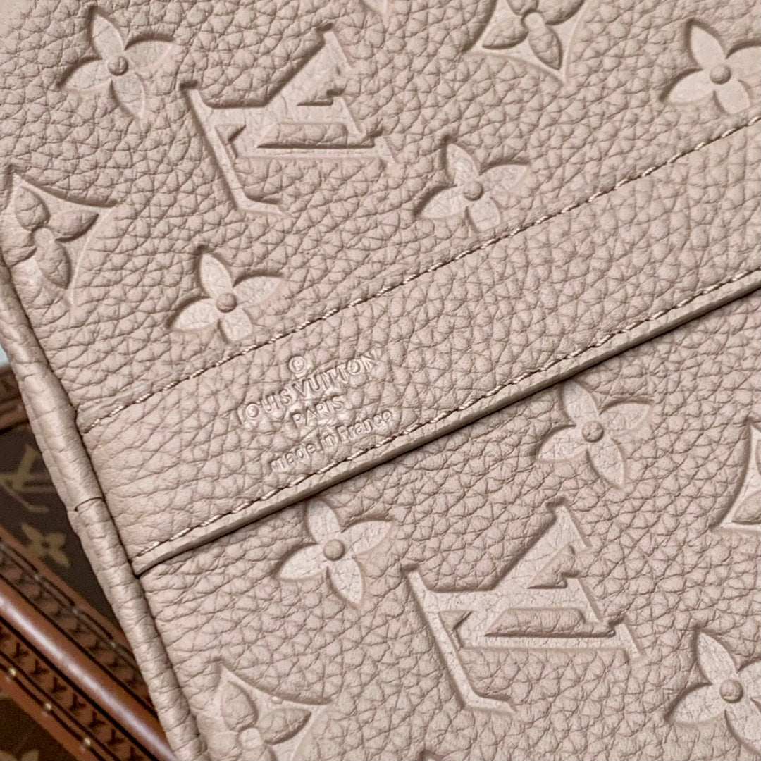 KEEPALL BANDOULIÈRE 34 BAG IN LIGHT BROWN MONOGRAM TAURILLON CALFSKIN