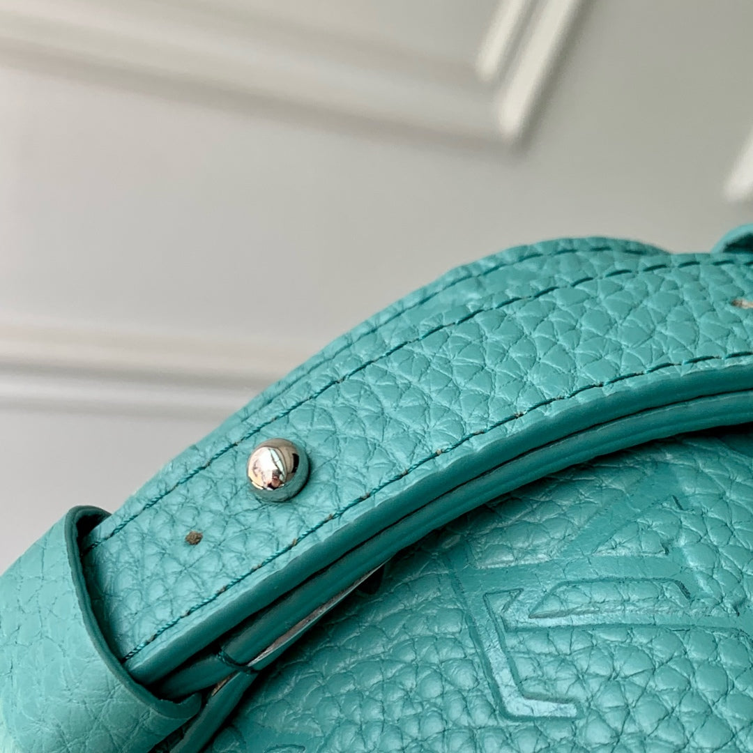 STEAMER WEARABLE WALLET 18 IN TEAL GREEN MONOGRAM TAURILLON CALFSKIN