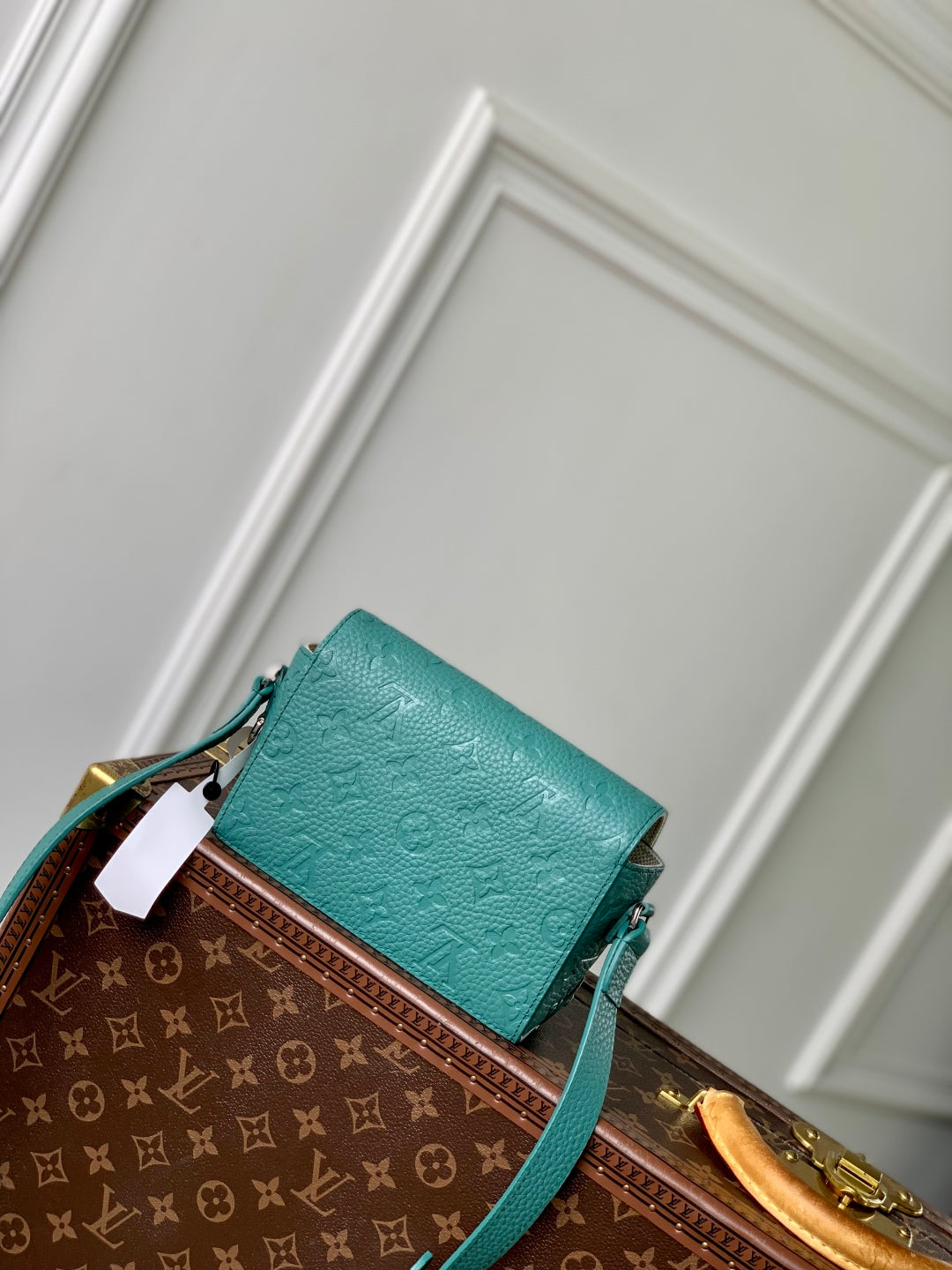 STEAMER WEARABLE WALLET 18 IN TEAL GREEN MONOGRAM TAURILLON CALFSKIN