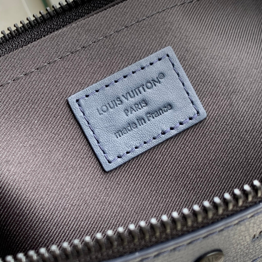 POCHETTE TOGO 30 IN DARK BLUE MONOGRAM ECLIPSE CALFSKIN EMBOSSED LOGO