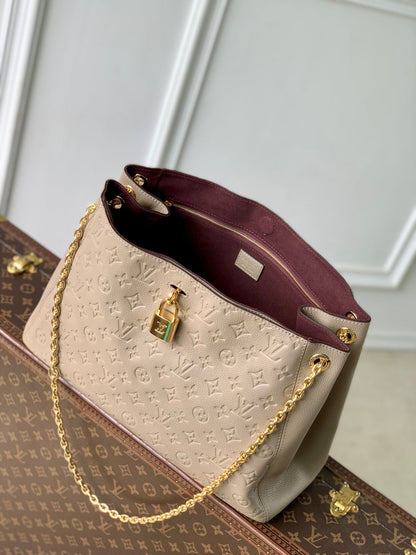 ANYTIME MM 42 IN TOURTERELLE GRAY MONOGRAM EMPREINTE CALFSKIN GOLD HARDWARE