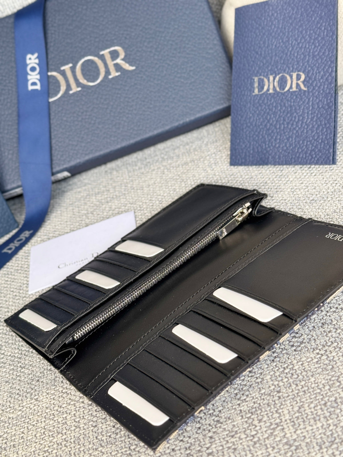 VERTICAL LONG WALLET 19 IN BLUE MONOGRAM OBLIQUE JACQUARD