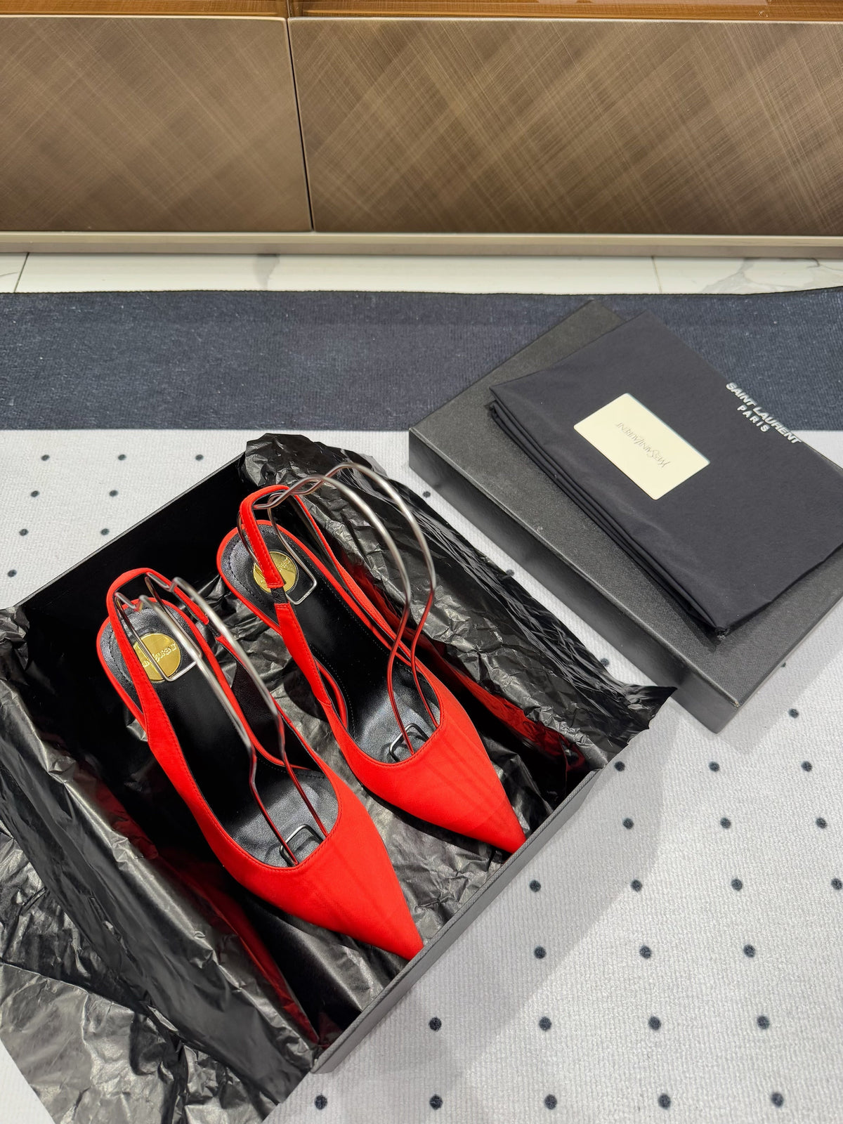 L'ENTRACTE SLINGBACK PUMPS IN RED SATIN