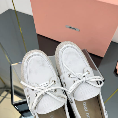 BOAT SHOES IN OFF WHITE CALFSKIN AND CANVAS