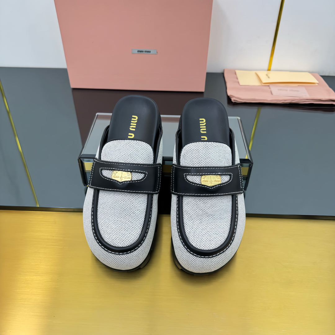 MULES SLIPPERS IN BLACK CALFSKIN AND WHITE DOTS CANVAS WITH GOLD COIN