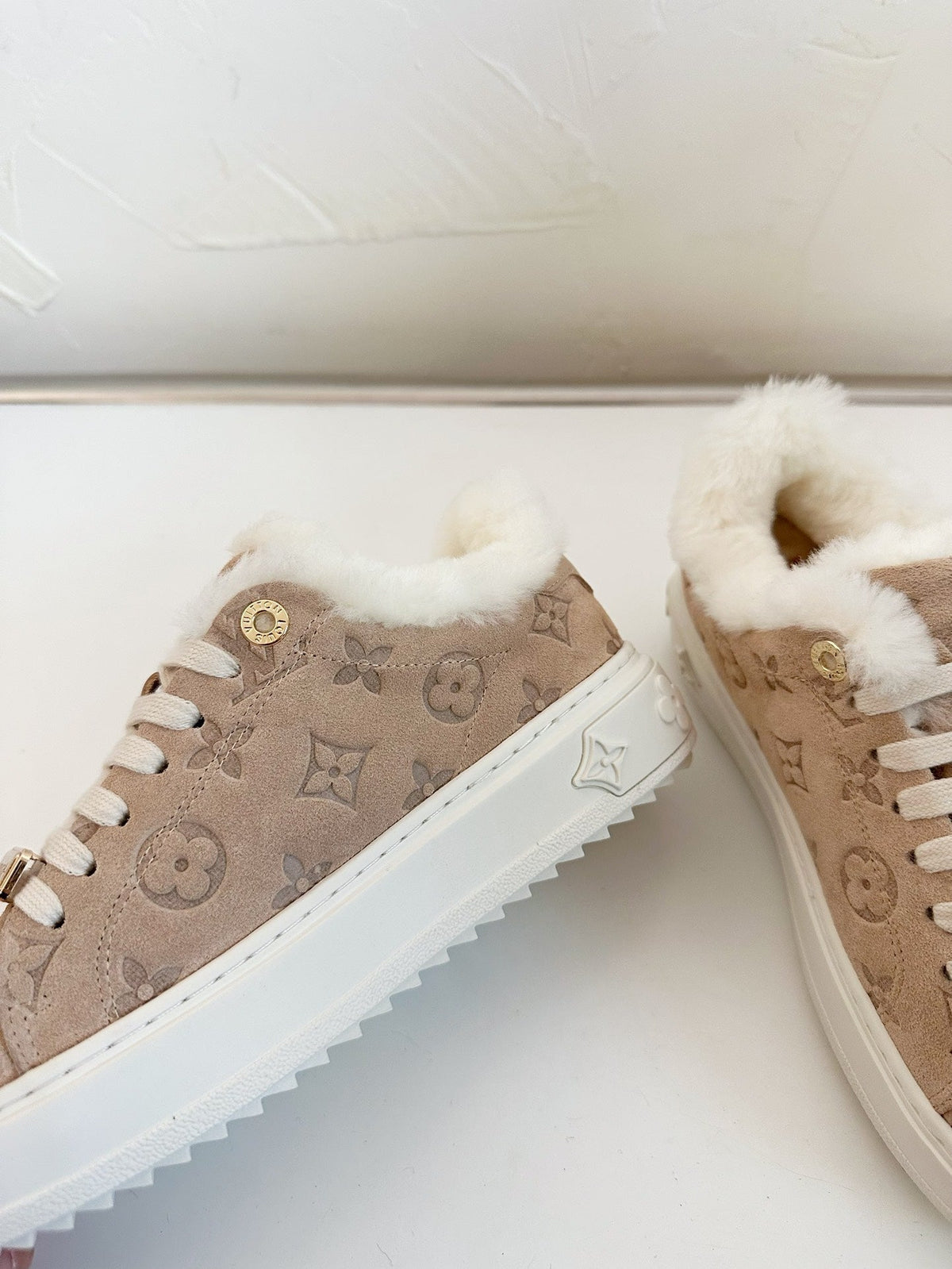 TIME OUT SNEAKER IN DESERT BROWN MONOGRAM EMBOSSED SUEDE WITH FLEECE LINING