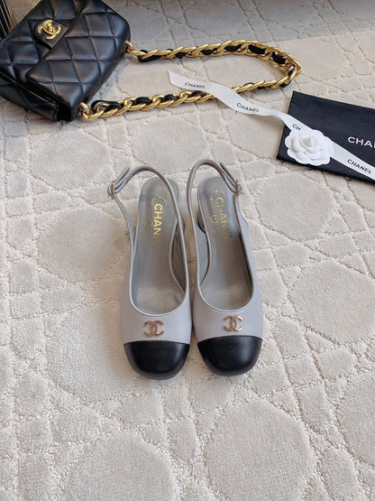 SLINGBACKS IN SLATE GREY MIX BLACK SHEEPSKIN