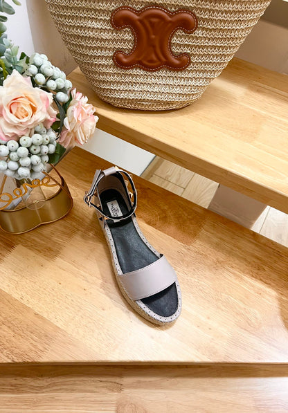 ROCKSTUD FLATFORM SANDAL IN SOFT PINK CALFSKIN