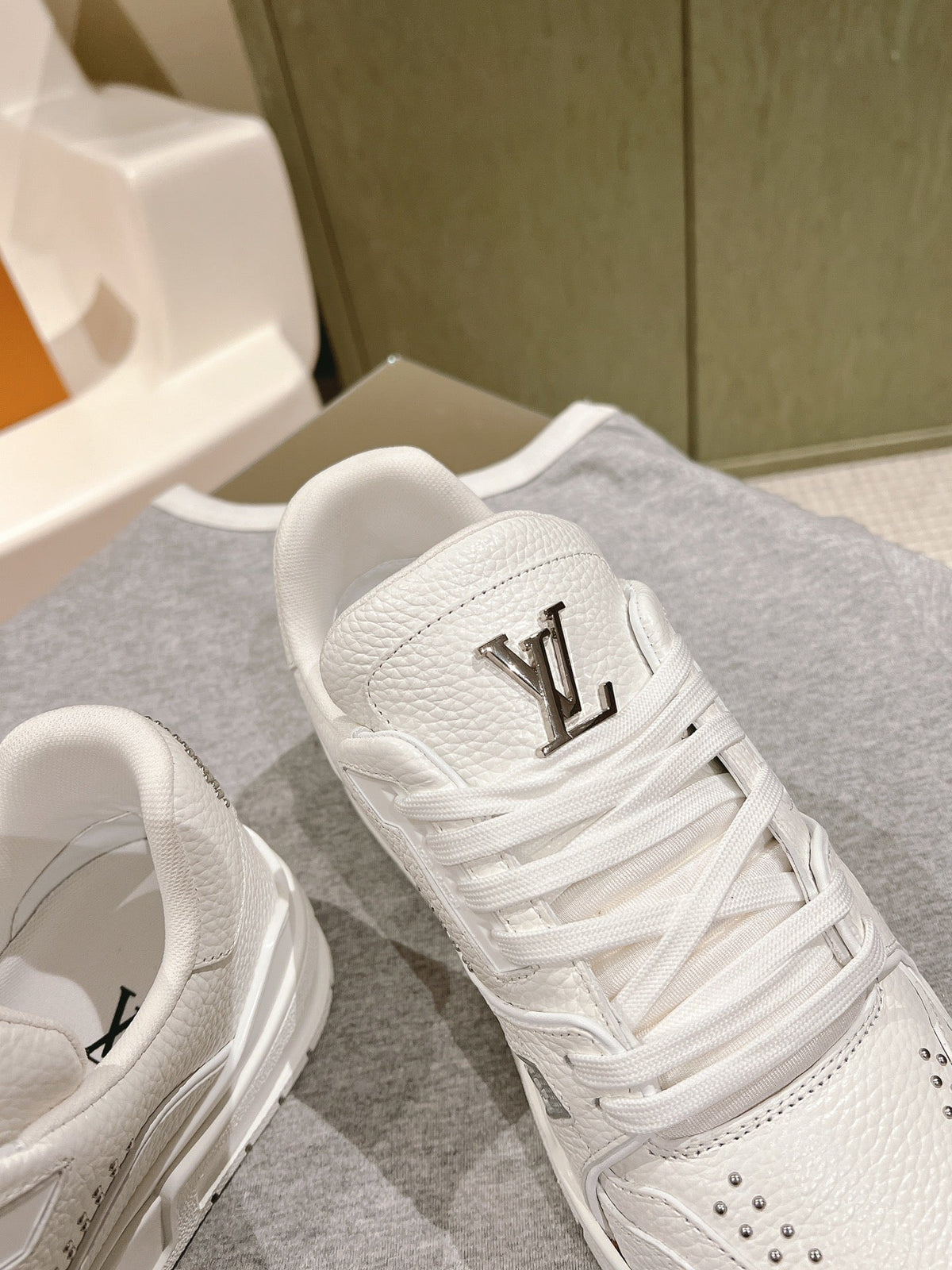 LV TRAINER SNEAKER IN WHITE CALFSKIN