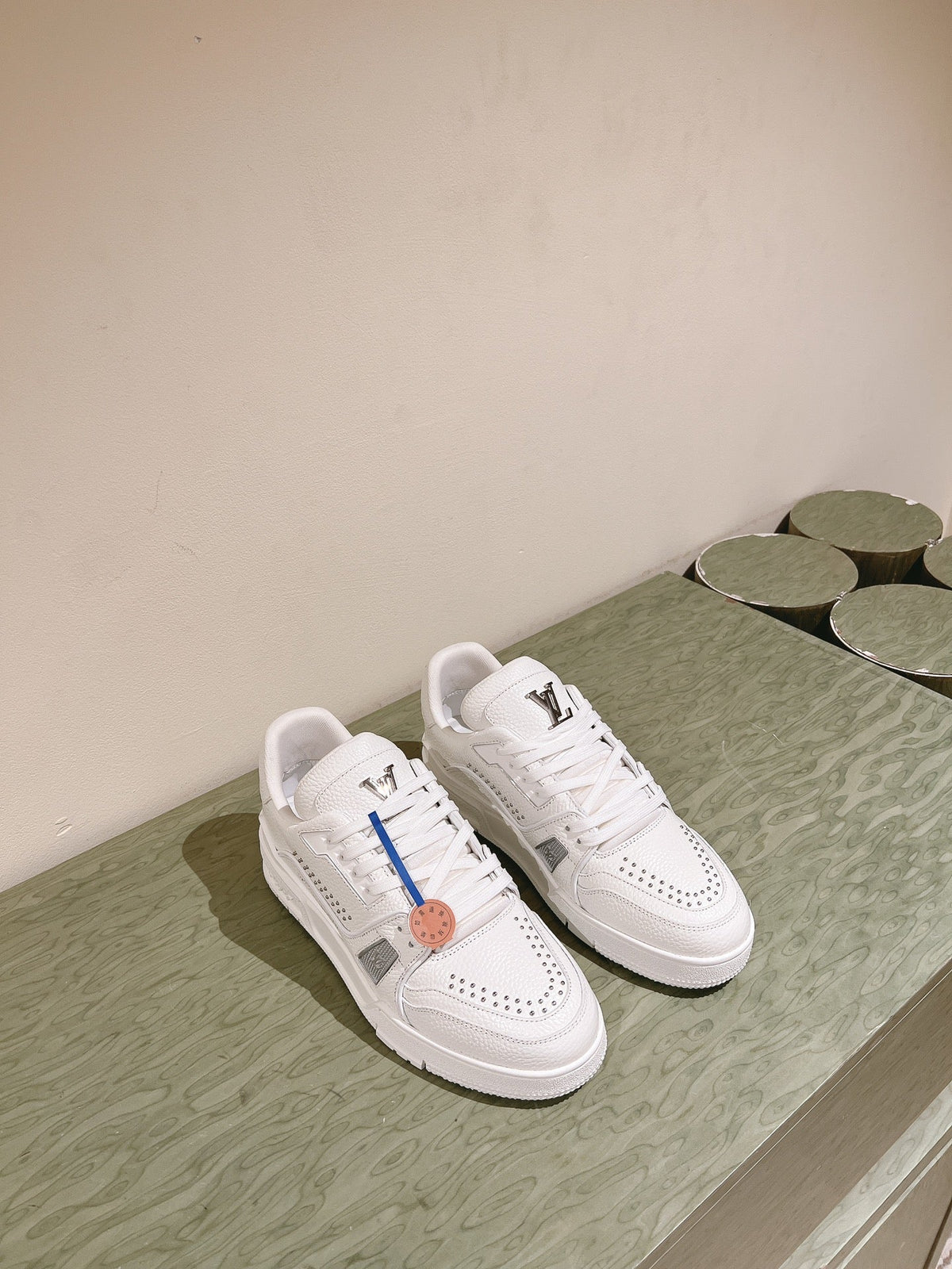 LV TRAINER SNEAKER IN WHITE CALFSKIN
