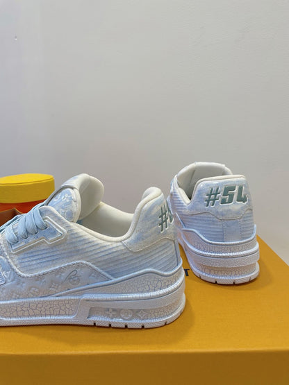 LV TRAINER MAXI SNEAKER IN WHITE MIX LIGHT BLUE EMBOSSED CALFSKIN