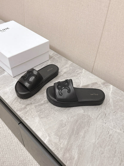 THICK-SOLED SLIDES IN BLACK SMOOTH LAMBSKIN LOGO WITH CRYSTALS