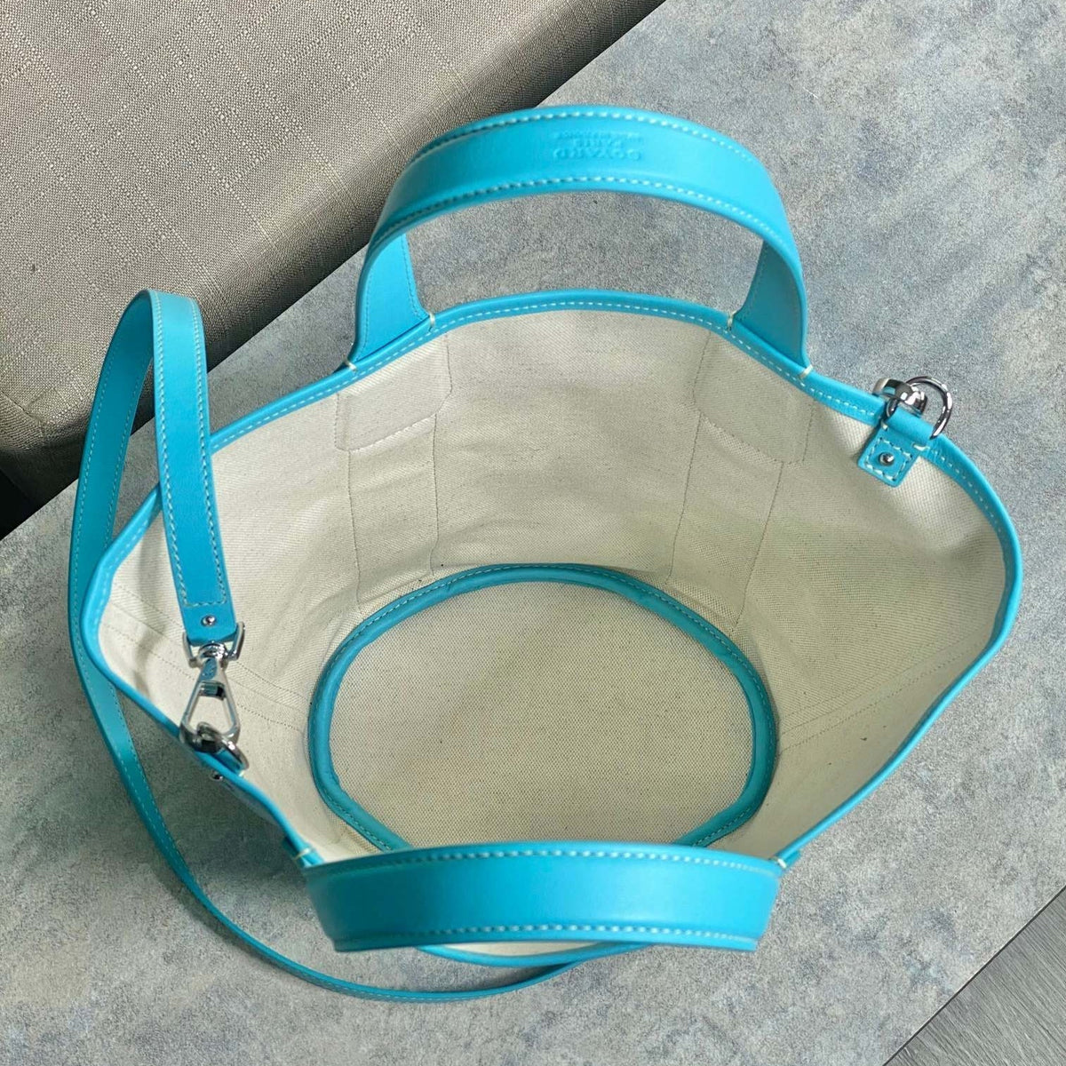 SMALL BELHARRA 24 IN BABY BLUE GOYARDINE CANVAS AND LAMBSKIN