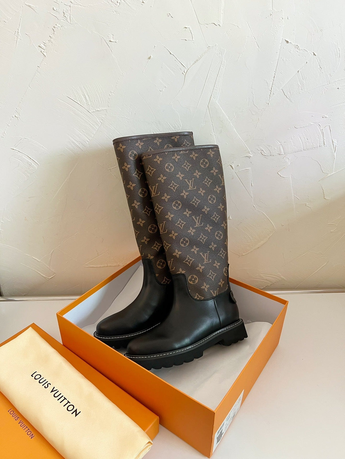 TERRITORY FLAT HIGH BOOT IN BLACK MIX CHOCOLATE BROWN MONOGRAM CALFSKIN