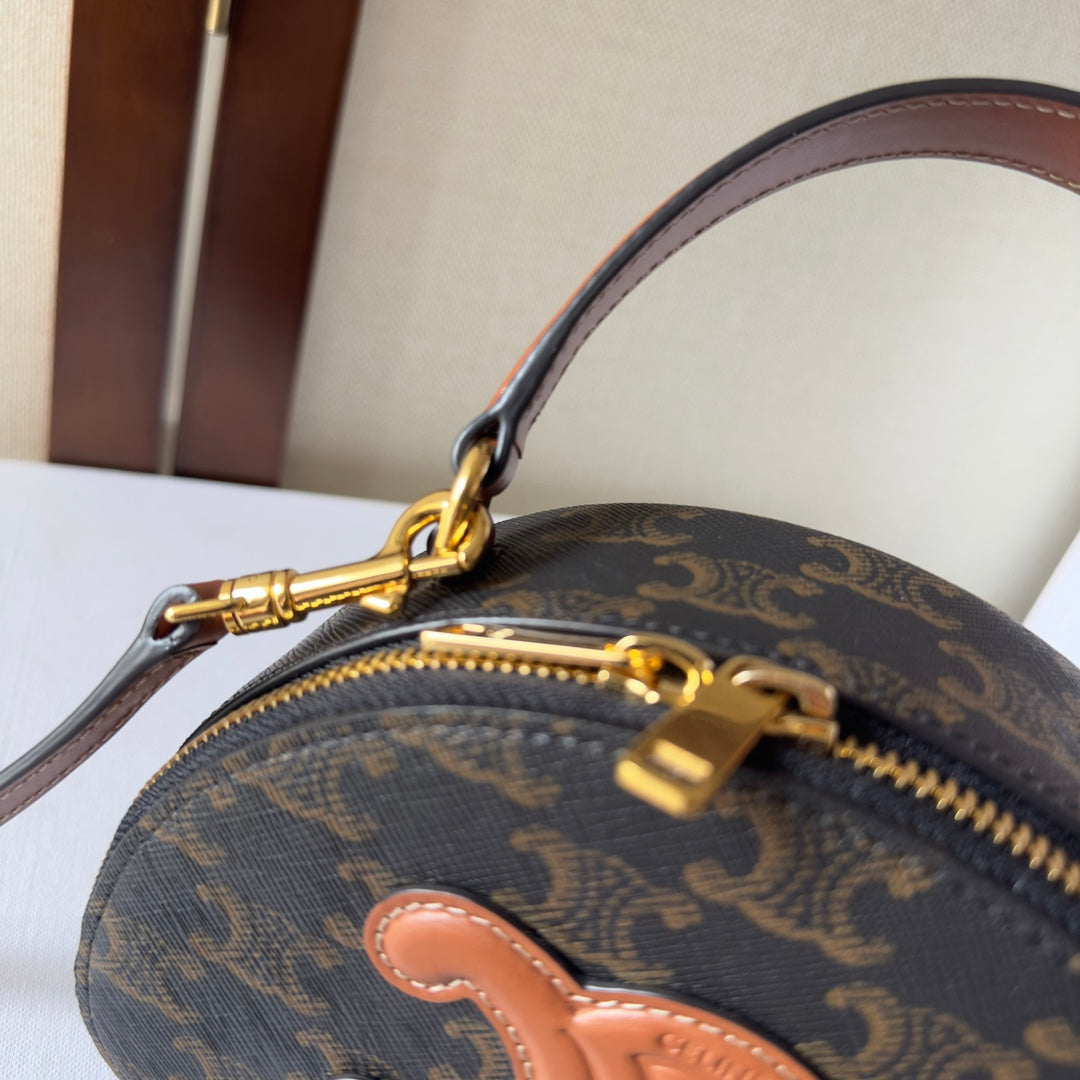 HALF MOON CASE 18 IN BLACK TRIOMPHE CANVAS AND BRONZE BROWN CALFSKIN