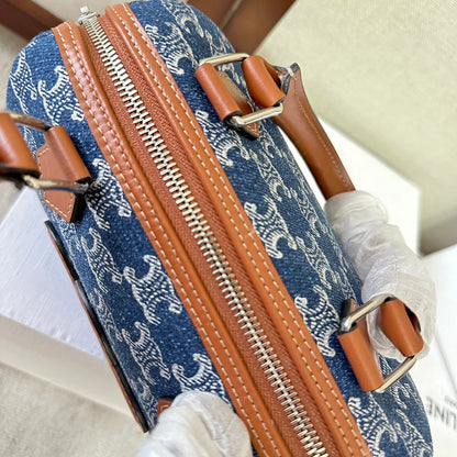 SMALL BOSTON 19 IN SPACE BLUE TRIOMPHE DENIM AND BROWN CALFSKIN TRIM