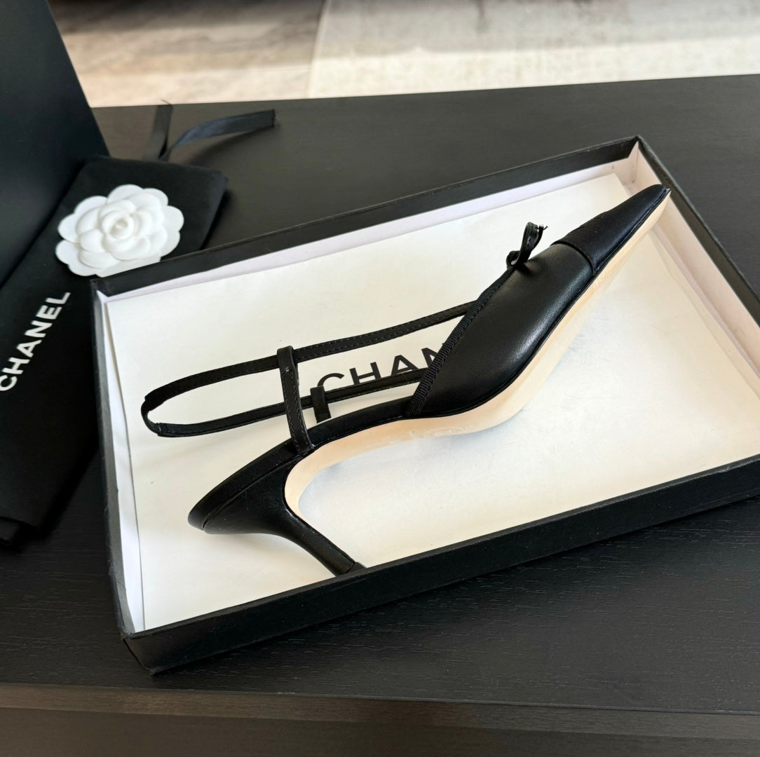 SLINGBACK WITH BOW IN BLACK LAMBSKIN