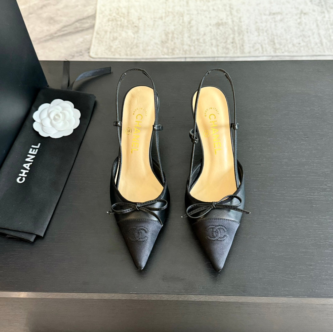 SLINGBACK WITH BOW IN BLACK LAMBSKIN