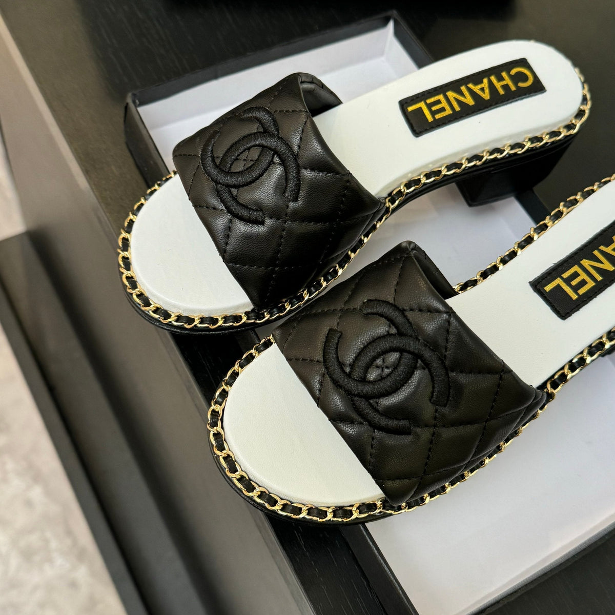 HIGH FLATFORM SLIPPER IN BLACK EMBOSSED SHEEPSKIN