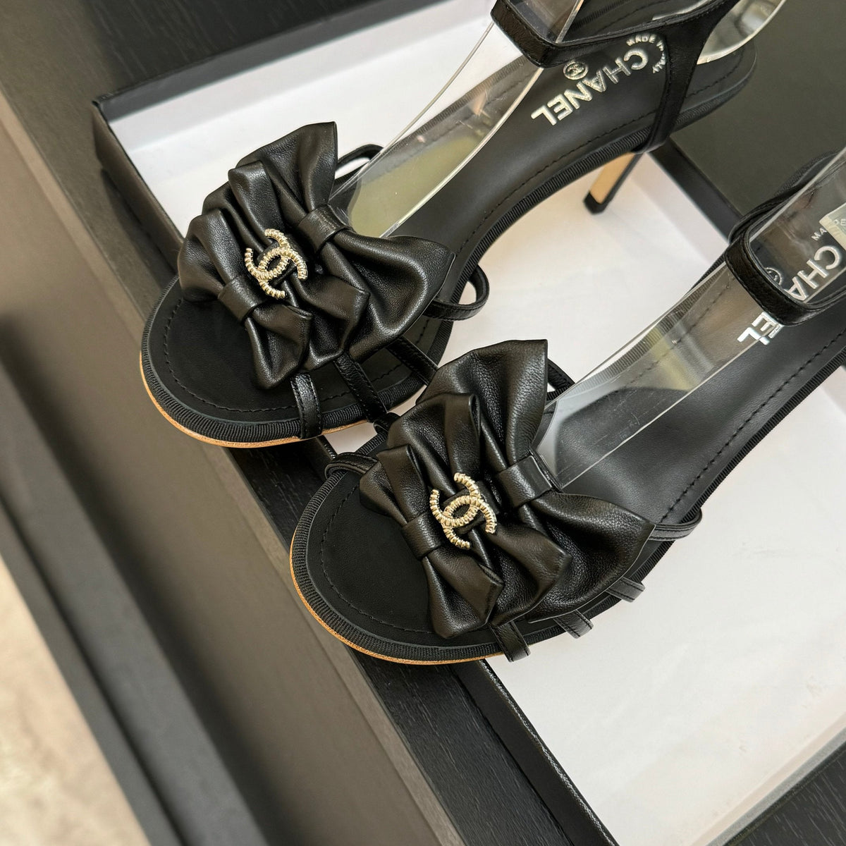HIGH HEEL SANDAL WITH BOW IN BLACK LAMBSKIN