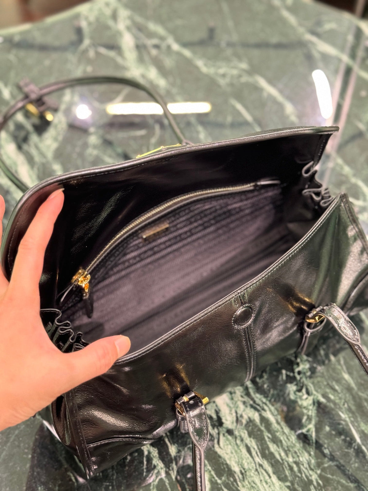 HANDBAG 31 IN BLACK OIL WAX LAMBSKIN