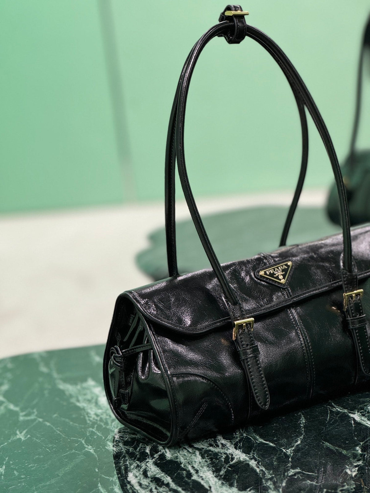 HANDBAG 31 IN BLACK OIL WAX LAMBSKIN