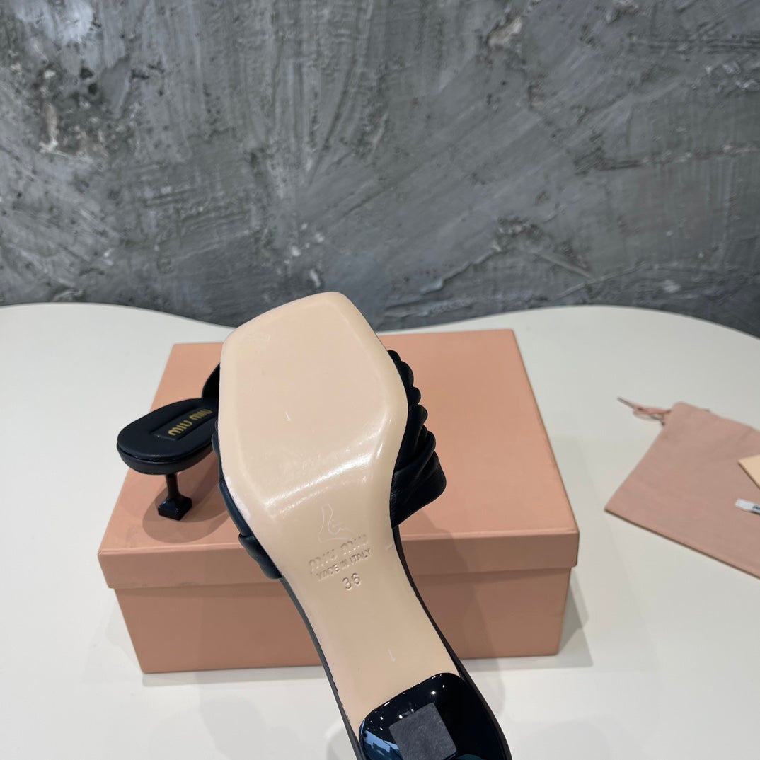 HIGH - HEEL BLACK SHEEPSKIN WITH STYLIZED STRAPS