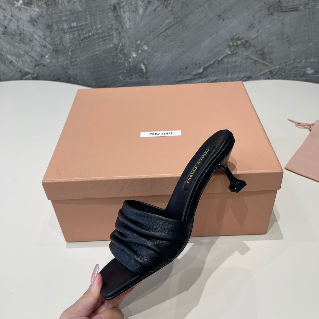 HIGH - HEEL BLACK SHEEPSKIN WITH STYLIZED STRAPS