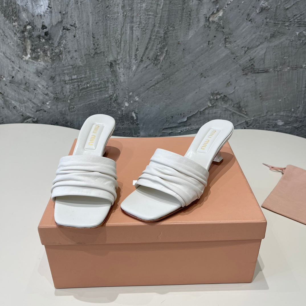 HIGH - HEEL WHITE SHEEPSKIN WITH STYLIZED STRAPS