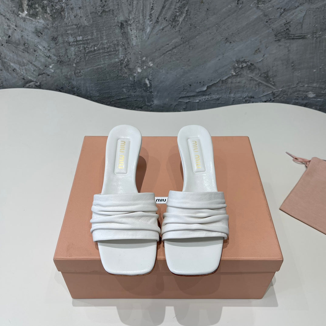 HIGH - HEEL WHITE SHEEPSKIN WITH STYLIZED STRAPS