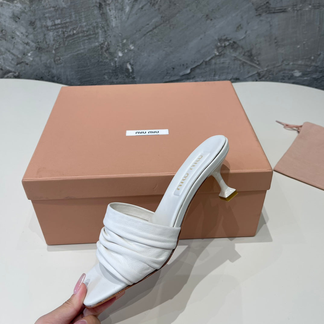 HIGH - HEEL WHITE SHEEPSKIN WITH STYLIZED STRAPS