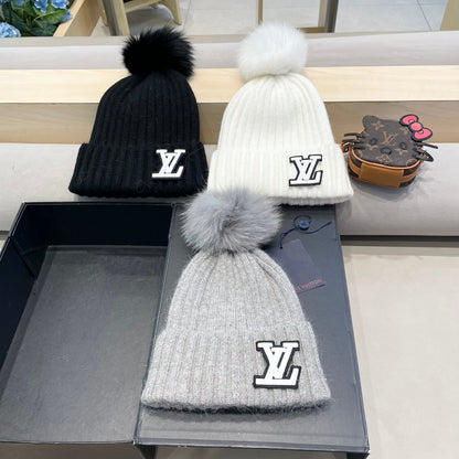 KNITTED BEANIE HAT IN BLACK WOOL 413369