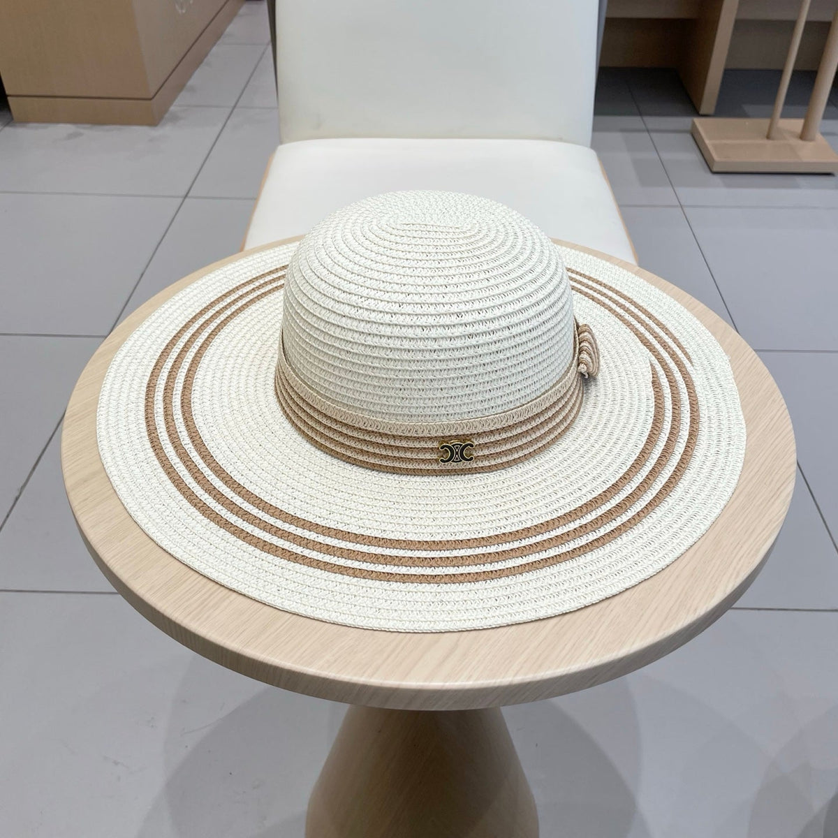 WIDE BRIM HAT MODEL 650411 IN CREAM WHITE & BROWN WOVEN STRAW