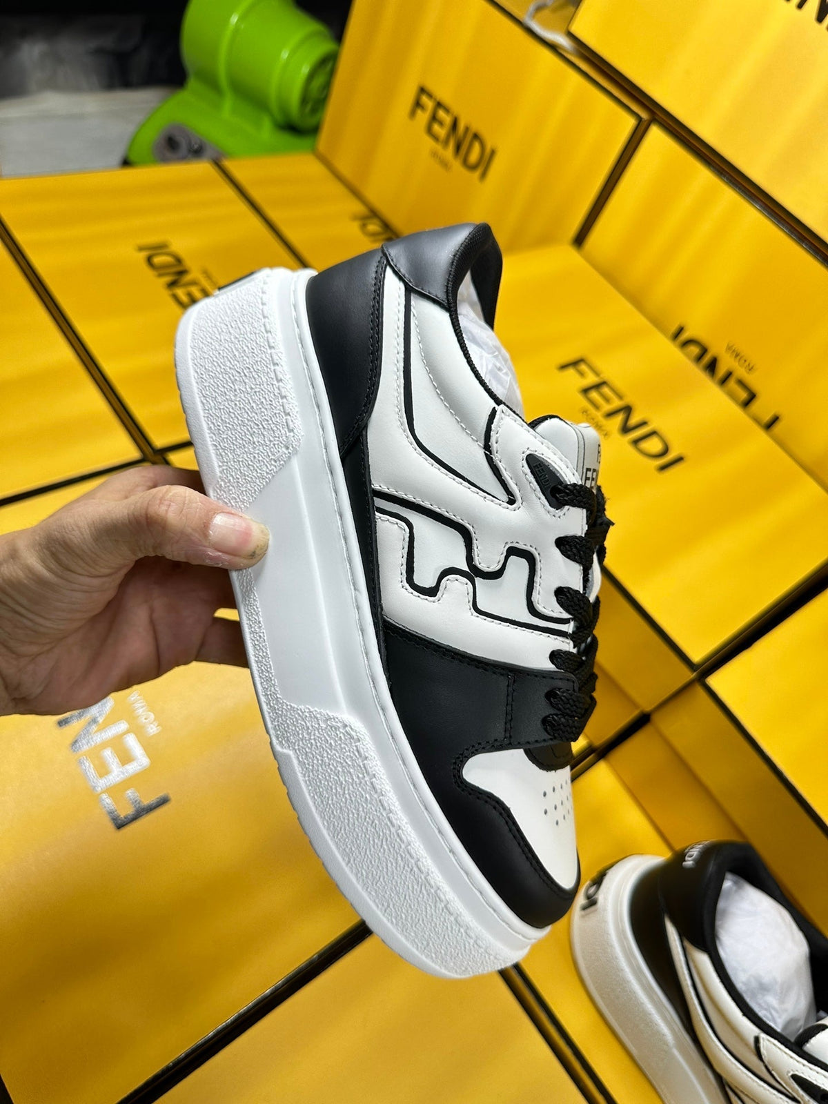FENDI THICK-SOLDED SNEAKER IN WHITE AND BLACK LAMBSKIN