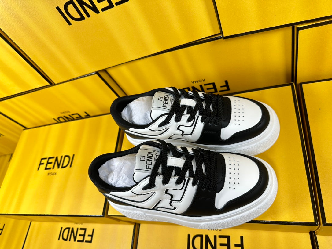 FENDI THICK-SOLDED SNEAKER IN WHITE AND BLACK LAMBSKIN