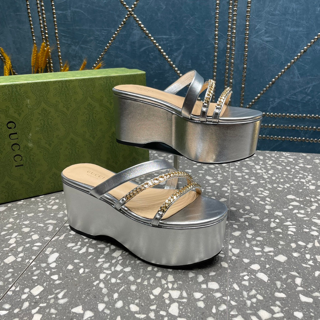 HIGH WEDGE PLATFORM IN SILVER CALFSKIN WITH GOLD HARDWARE