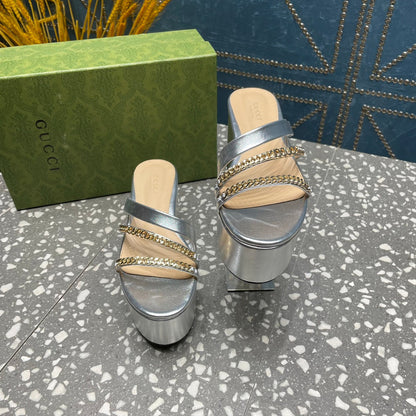 HIGH WEDGE PLATFORM IN SILVER CALFSKIN WITH GOLD HARDWARE
