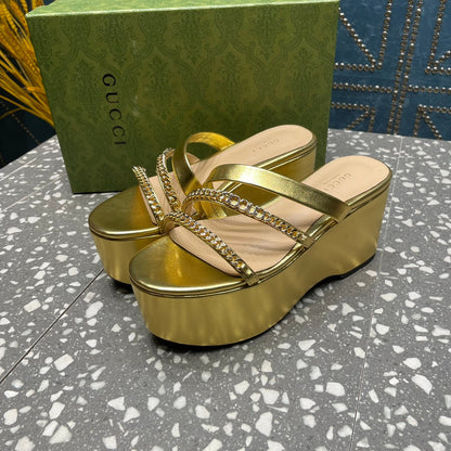 HIGH WEDGE PLATFORM IN GOLD CALFSKIN WITH GOLD HARDWARE