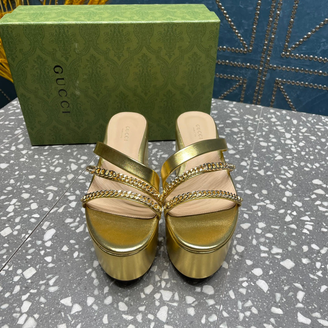 HIGH WEDGE PLATFORM IN GOLD CALFSKIN WITH GOLD HARDWARE