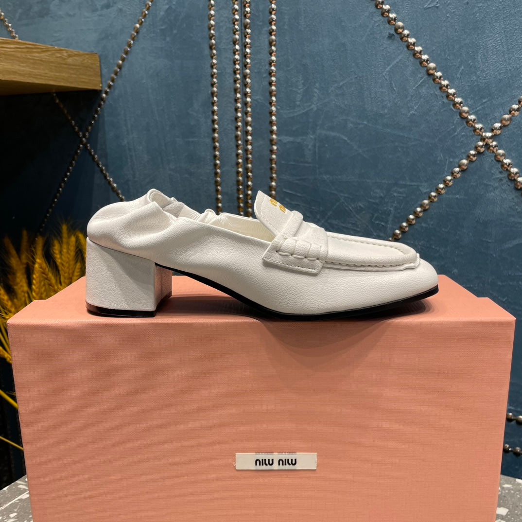 HIGH BROGUE LOAFERS IN WHITE LAMBSKIN